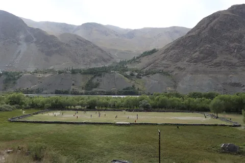 Soccer playing amidst scenic views