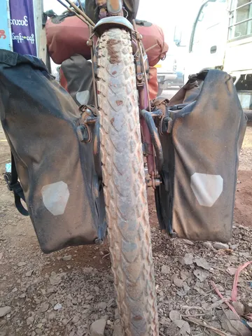 After the dusty road, my bike is even "redder" than before!