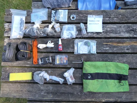 By the way, that's What's in my "spare parts bag" at the moment (LTR): Rohloff cable, speedometer, sprocket, chain, spoke tightener, chain lock, metal screws, ortlieb screws, patch kit, 2 tubes, tent pegs, small tool, sewing kit, patches, rubber band, locktite, tent repair kit, mattress repair kit, plastic tape, bag repair kit