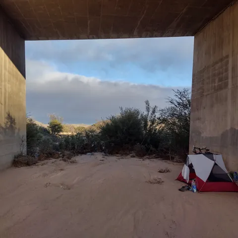 Oh look, a tent under a bridge...