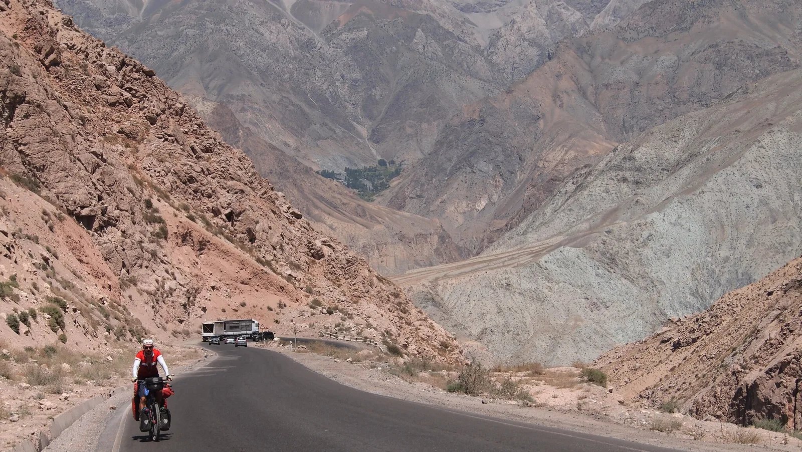 I conquer the Anzob tunnel with the help of local truck drivers and a Japanese cyclist